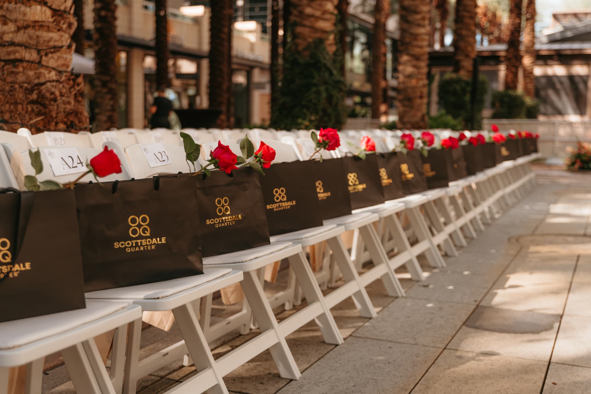 Scottsdale Quarter gift bags and red roses on front-row seats