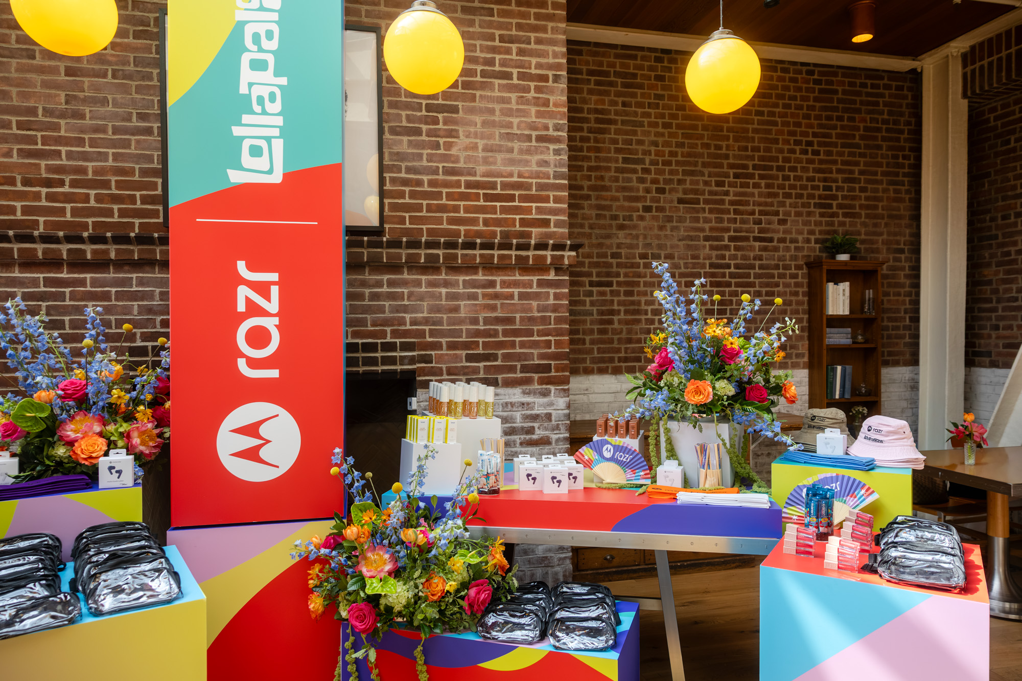 Lollapalooza and razr activation space with branded displays, gifting and florals at the Chicago rooftop