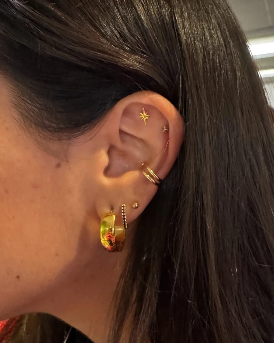 Gold star Revelmarks ear stack with hoops at CommerceNext