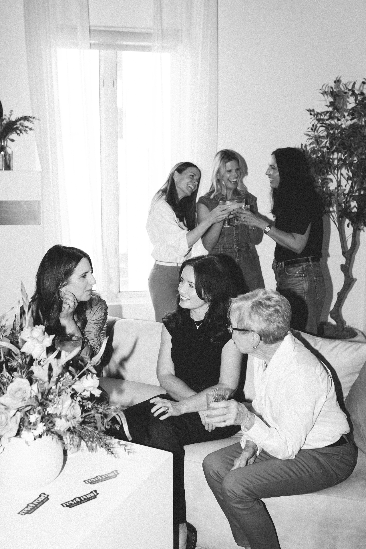 Guests gathered in the lounge at a Revel Road event